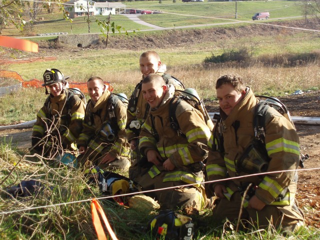 Reese members assigned to different hose line teams prepare to enter into the building.  Photo taken by D. Bloskey